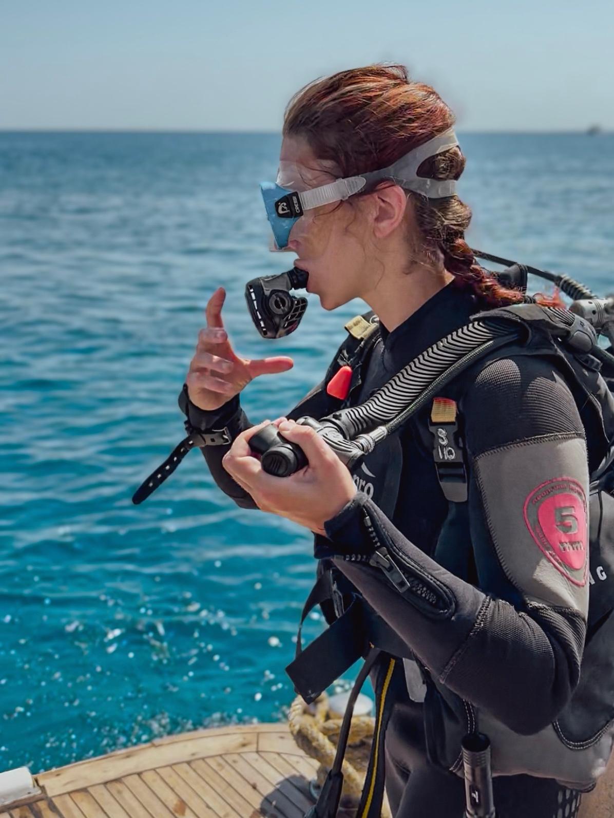 Aida Marin ready for a dive by the sea